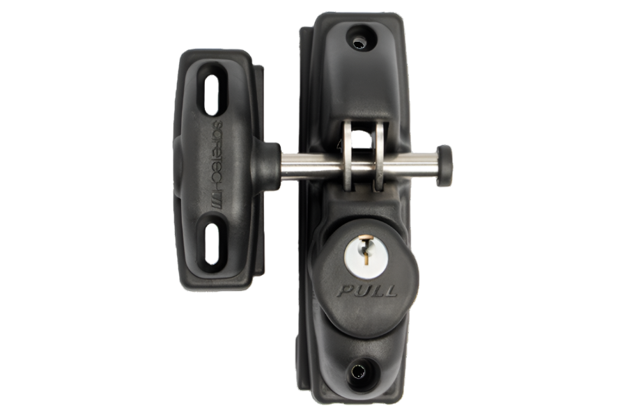 A black and silver Safetech key lock, featuring a key inserted in the lock.