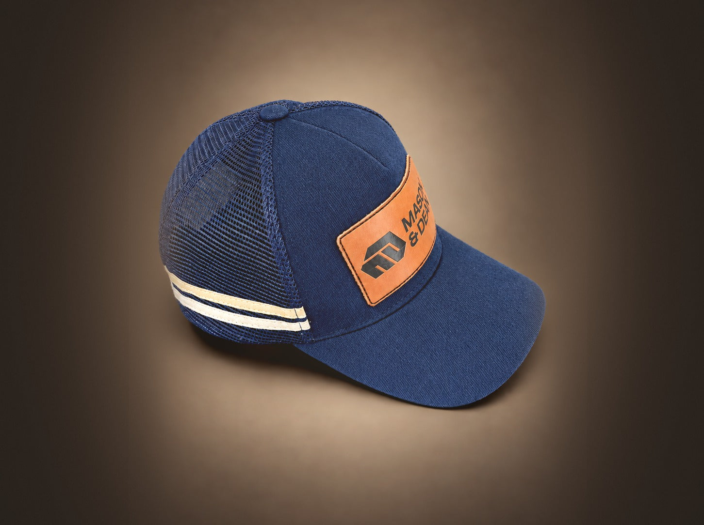 Side view of the Mason & Dean trucker cap showing the mesh back and cream stripes