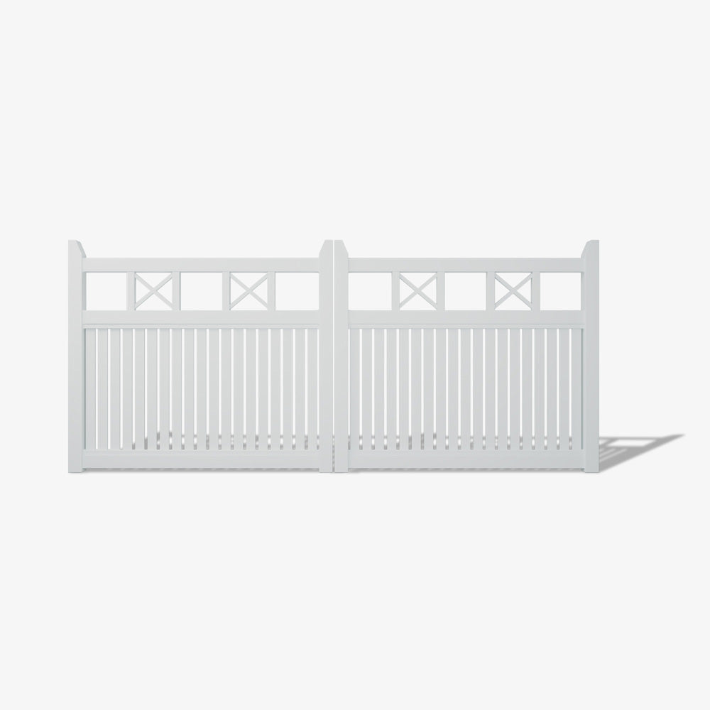 Mason & Dean Newport double driveway gate designed in a coastal Hamptons style with vertical slats and decorative cross-bracing, creating a bright and elegant entrance for seaside or suburban homes.